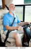 stock-photo-vertical-view-of-a-senior-man-driving-his-motor-home-30555307.jpg