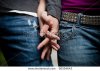 stock-photo-close-up-image-of-a-young-couple-holding-hands-60504643.jpg