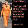 hillary-orange-jumpsuit.png