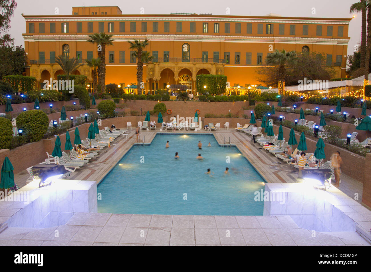 The pool and recreation area of the Marriott Hotel Zamalek in Cairo, Egypt at dusk Stock Photo