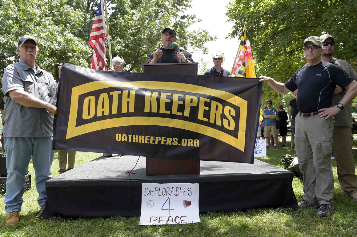 Stewart Rhodes, founder of the citizen militia group known as the Oath Keepers, center, speaks during a rally outside the White House in 2017. 