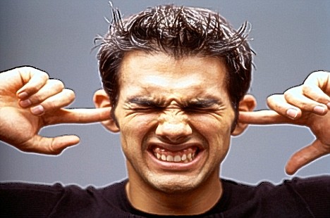 man-with-fingers-in-ears.jpg